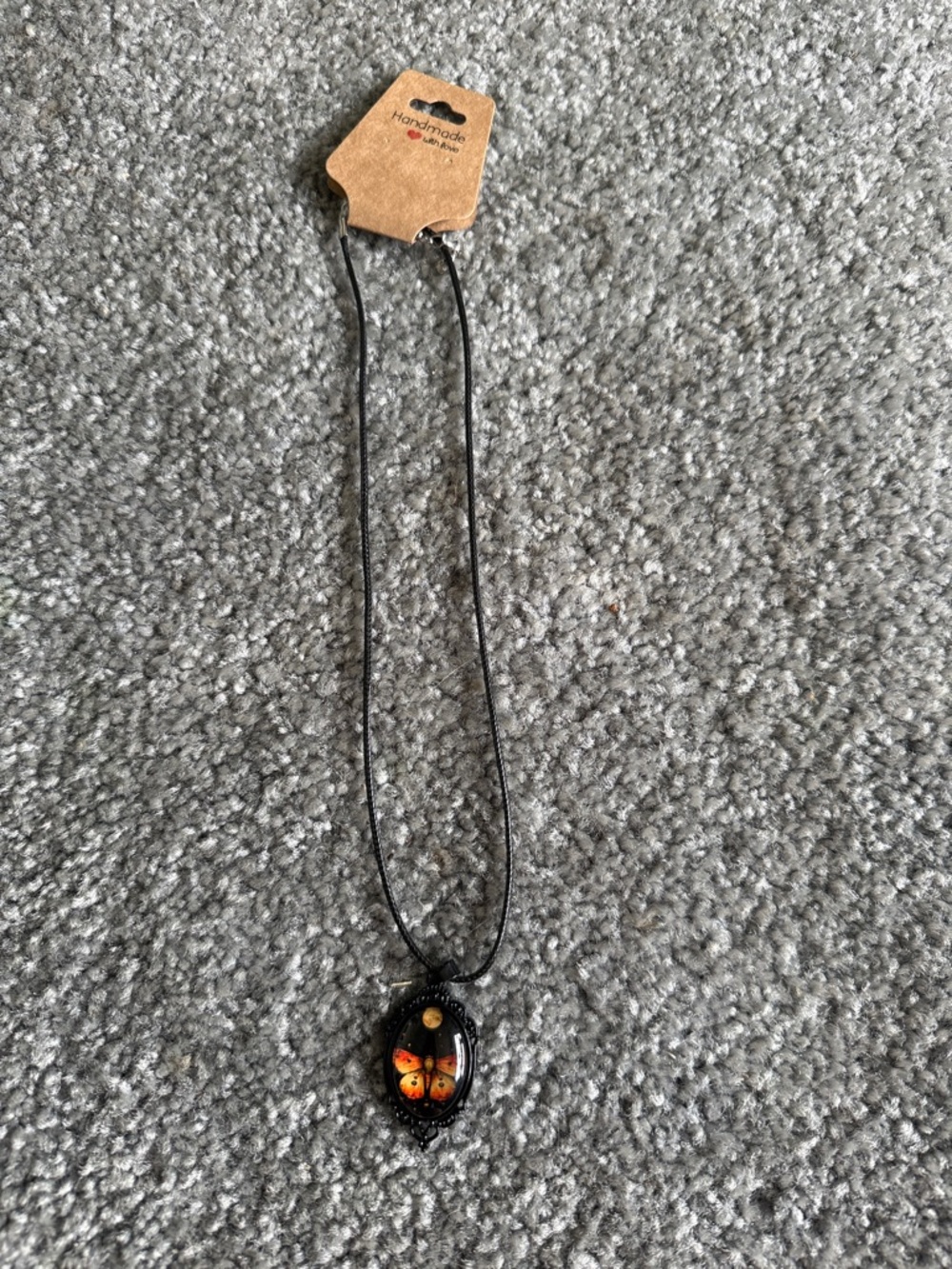 Black Necklace with Orange Butterfly Pendant by